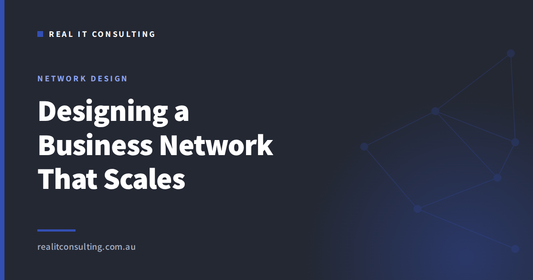 Real IT Consulting article cover: designing a business network with VLANs, switching and wireless