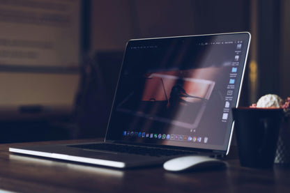 Dell Latitude 7300 i7 16GB — sleek silver laptop on wooden desk